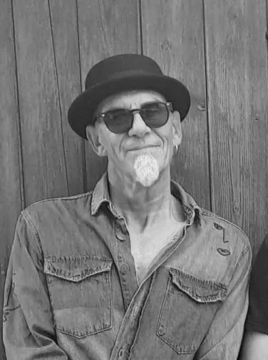 "June" Kovarik — Guitar, Backing Vocals